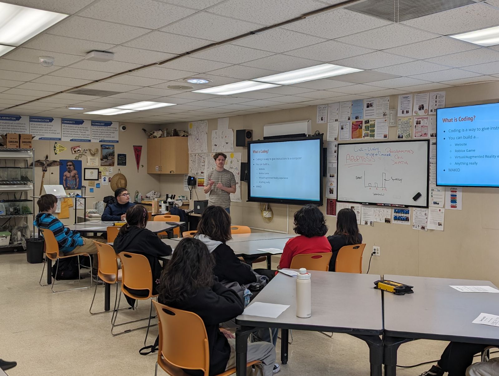 Eric giving a presentation on software engineering to high school students.